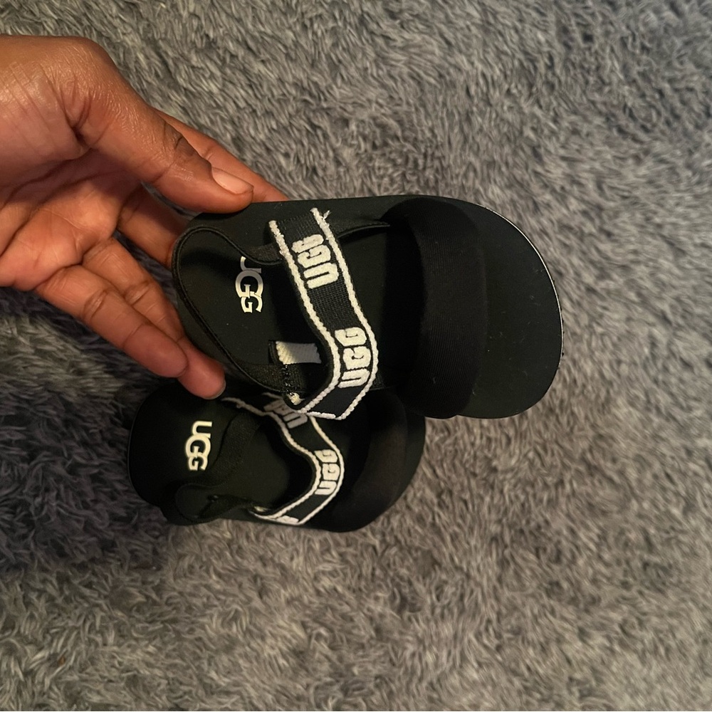 UGG Black Sandals with White Logo Strap